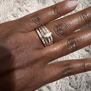 Certified 10 carat white gold engagement ring and wedding band. Size 9.